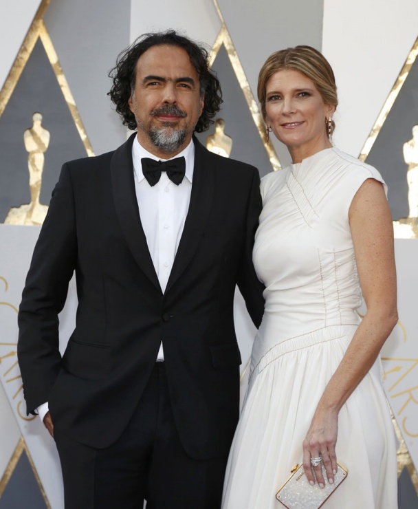 Alejandro Gonzlez Irritu y su esposa.
